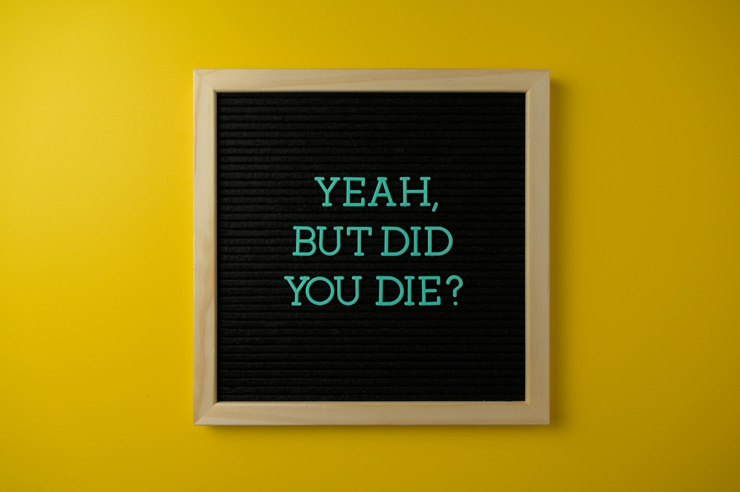 A vibrant motivational message board with text on a bright yellow background.